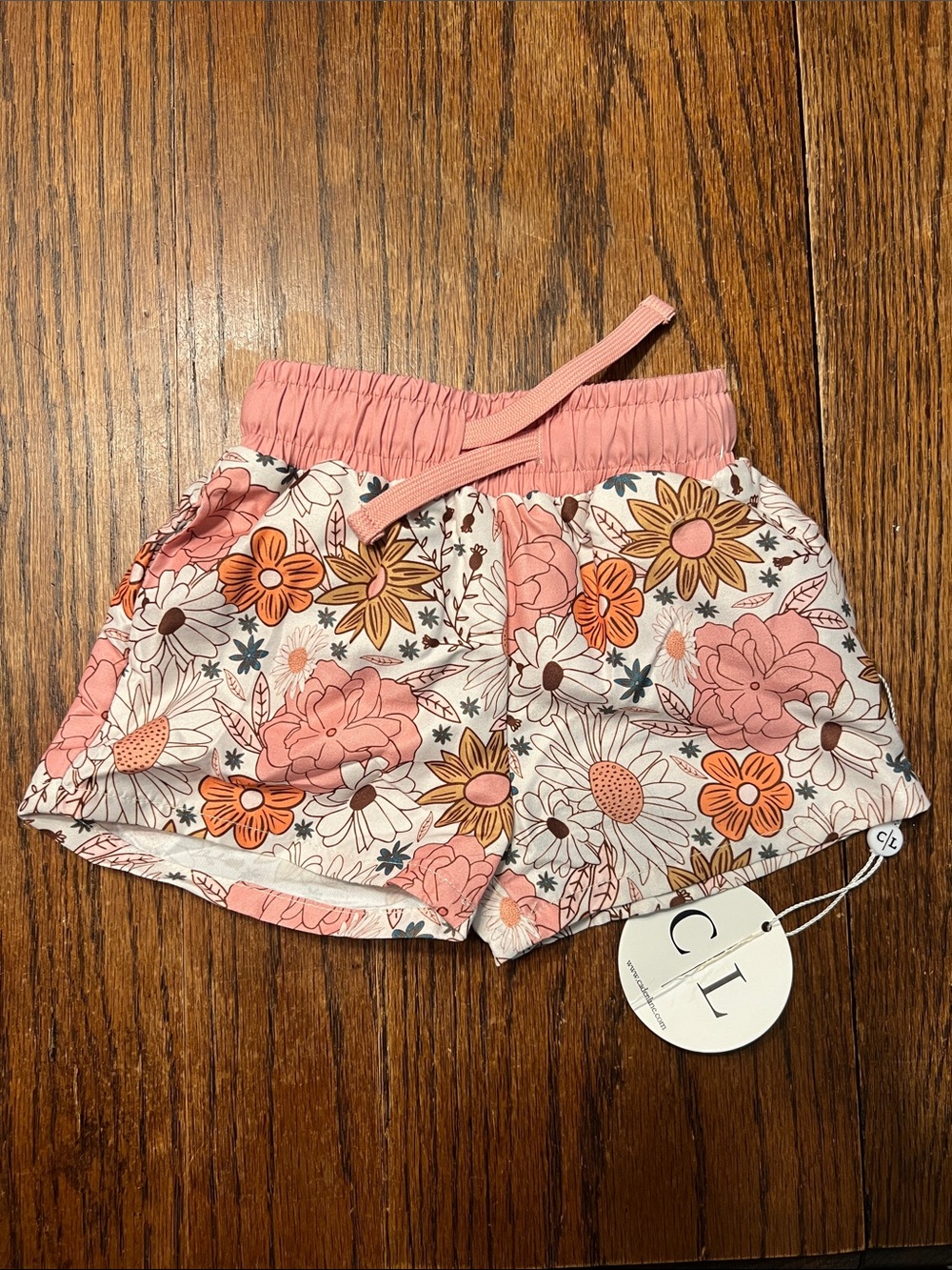 Caden Lane White Floral Swim Trunks with Orange and Pink Accents